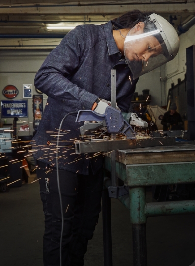 person working on metal